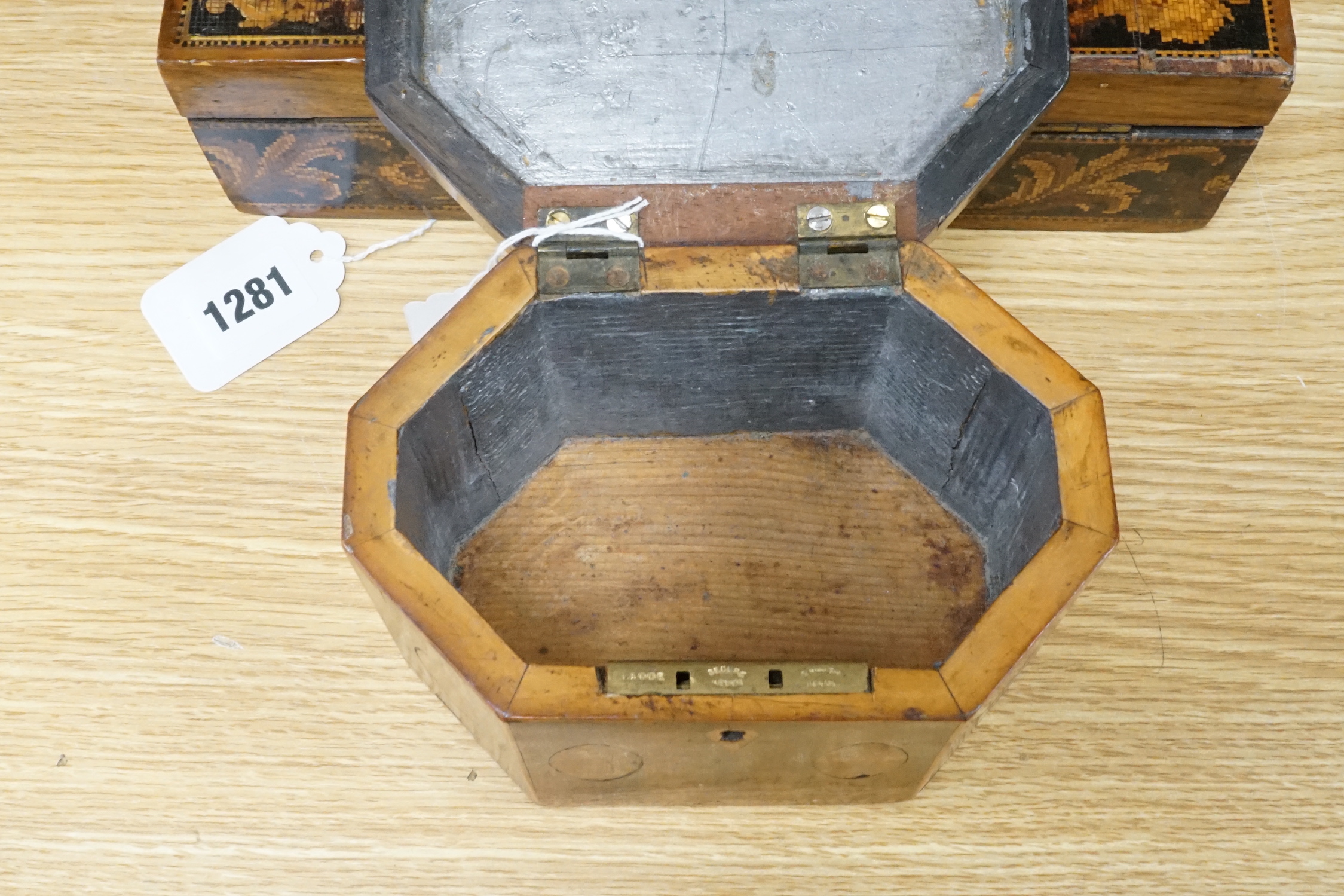 A walnu brass bound writing slope, an octagonal inlaid tea caddy and a Tunbridgeware box, 26cm wide, 22cm deep